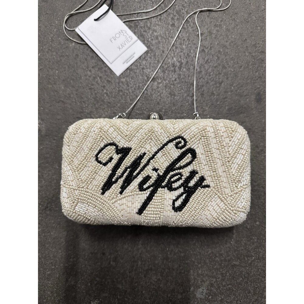 From St Xavier Wifey Medium Clutch in Black & White